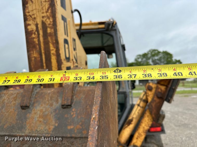 image for item NR9878 New Holland  575D backhoe