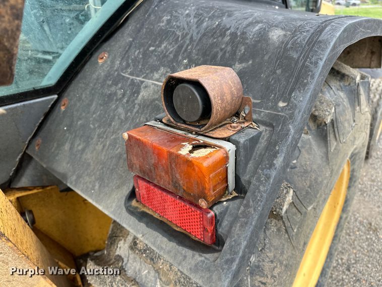 image for item NR9878 New Holland  575D backhoe