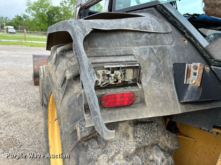 image for item NR9878 New Holland  575D backhoe