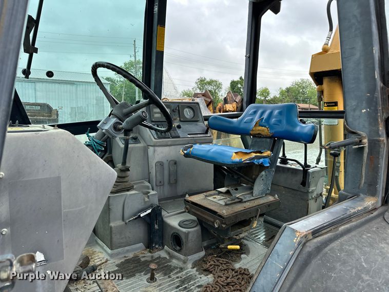 image for item NR9878 New Holland  575D backhoe