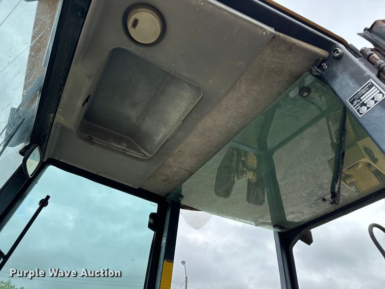 image for item NR9878 New Holland  575D backhoe