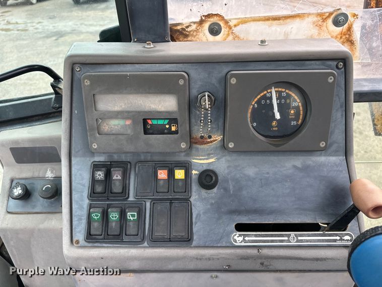 image for item NR9878 New Holland  575D backhoe