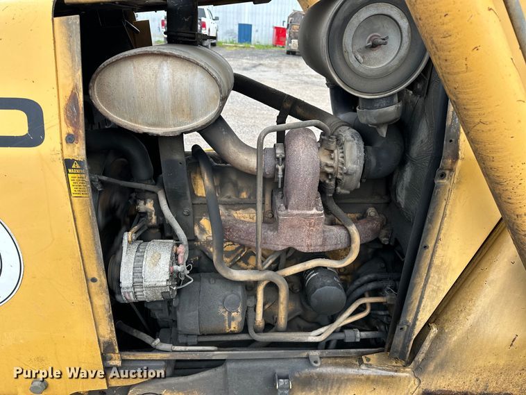 image for item NR9878 New Holland  575D backhoe