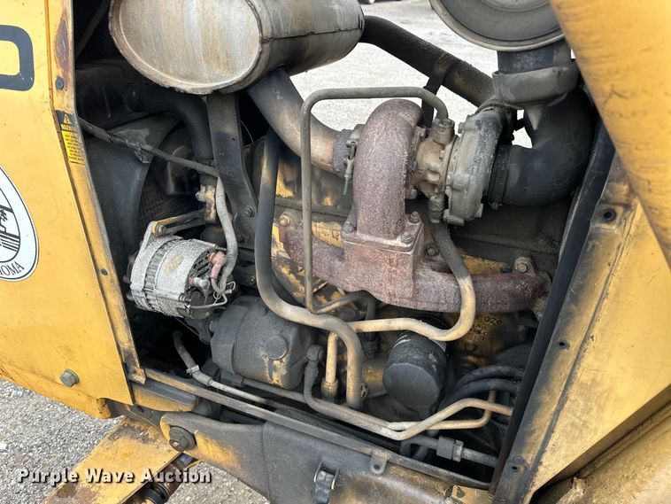 image for item NR9878 New Holland  575D backhoe