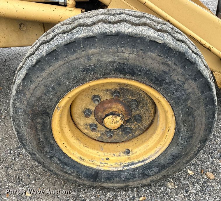 image for item NR9878 New Holland  575D backhoe