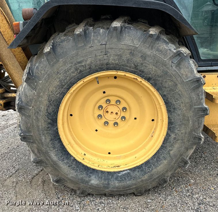 image for item NR9878 New Holland  575D backhoe