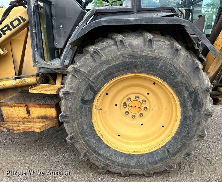 image for item NR9878 New Holland  575D backhoe