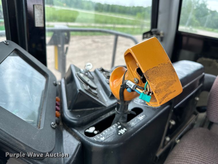 image for item NR9772 2009 Massey Ferguson  9635 swather / windrower