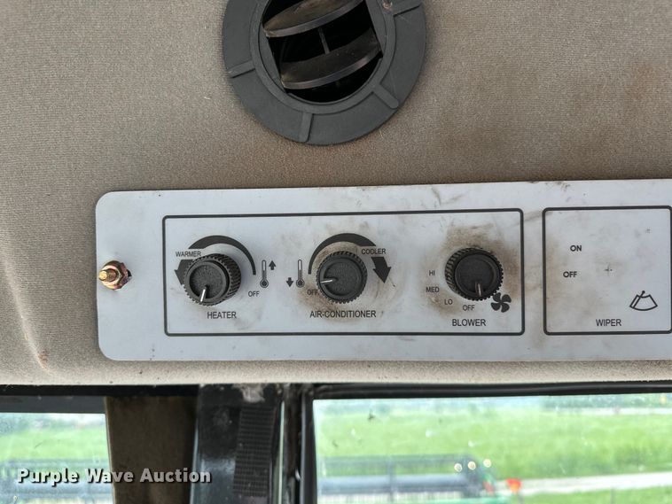 image for item NR9772 2009 Massey Ferguson  9635 swather / windrower