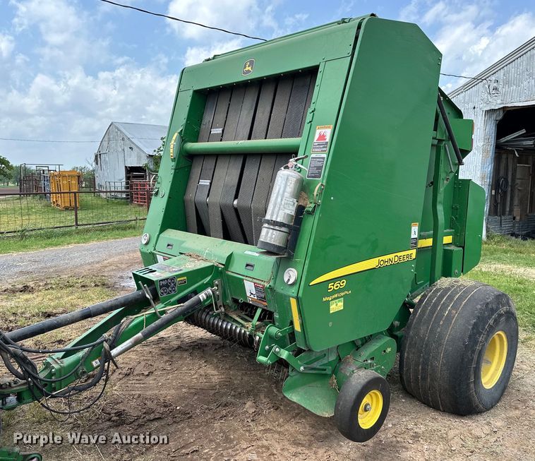 image for item NR9830 2013 John Deere 569 MegaWidePlus round baler
