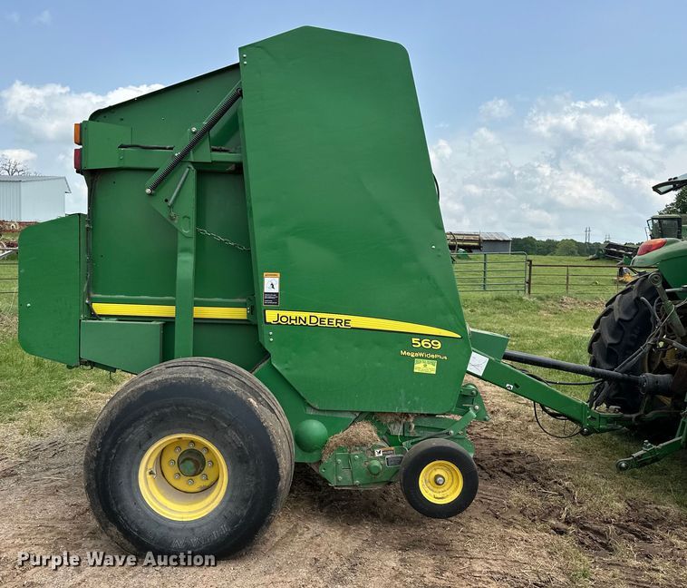 image for item NR9830 2013 John Deere 569 MegaWidePlus round baler