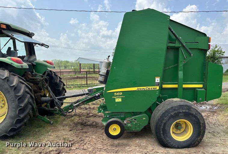 image for item NR9830 2013 John Deere 569 MegaWidePlus round baler
