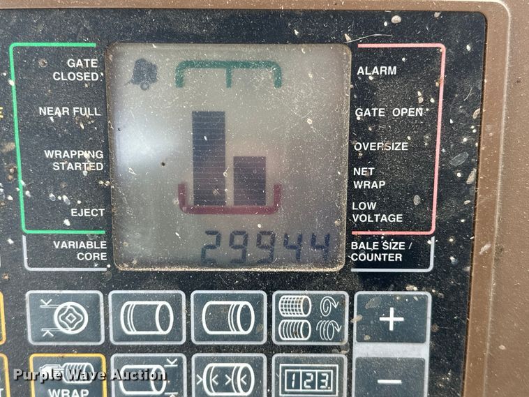 image for item NR9830 2013 John Deere 569 MegaWidePlus round baler