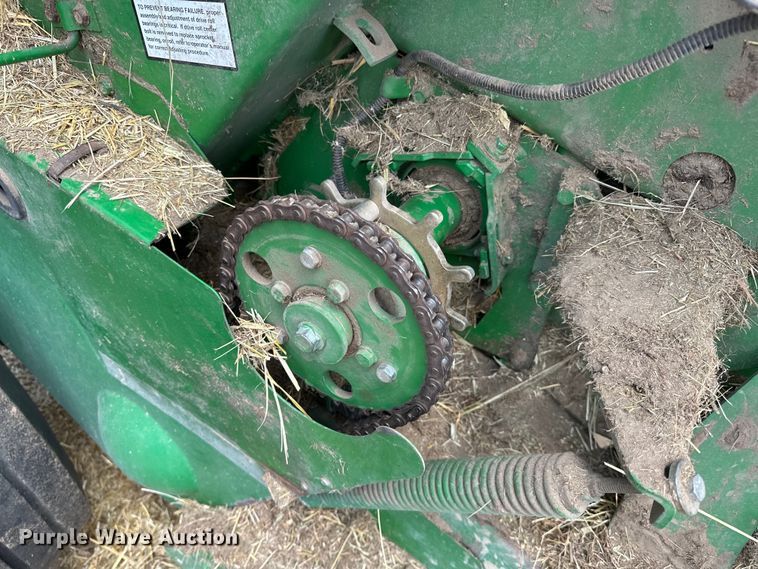 image for item NR9830 2013 John Deere 569 MegaWidePlus round baler