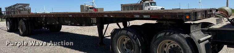 image for item EJ0554 1999 Daco flatbed trailer