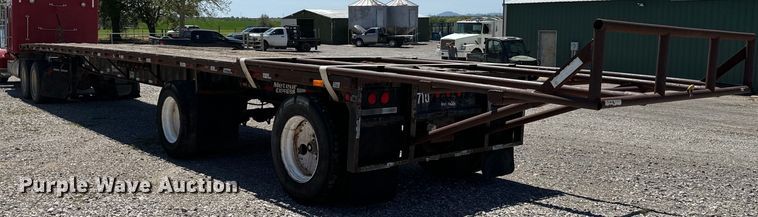 image for item EJ0554 1999 Daco flatbed trailer