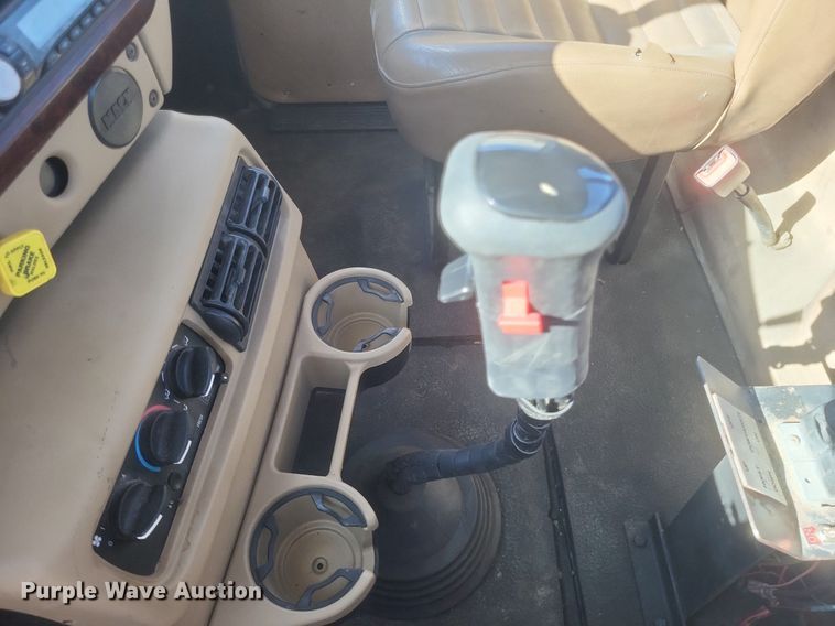 image for item EJ7951 2002 Mack Granite CV713 rollback truck