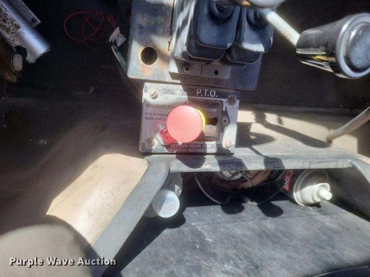 image for item EJ7951 2002 Mack Granite CV713 rollback truck