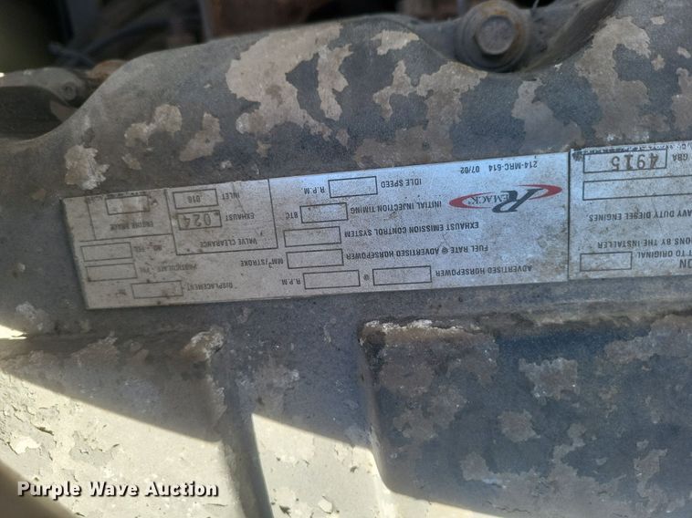 image for item EJ7951 2002 Mack Granite CV713 rollback truck