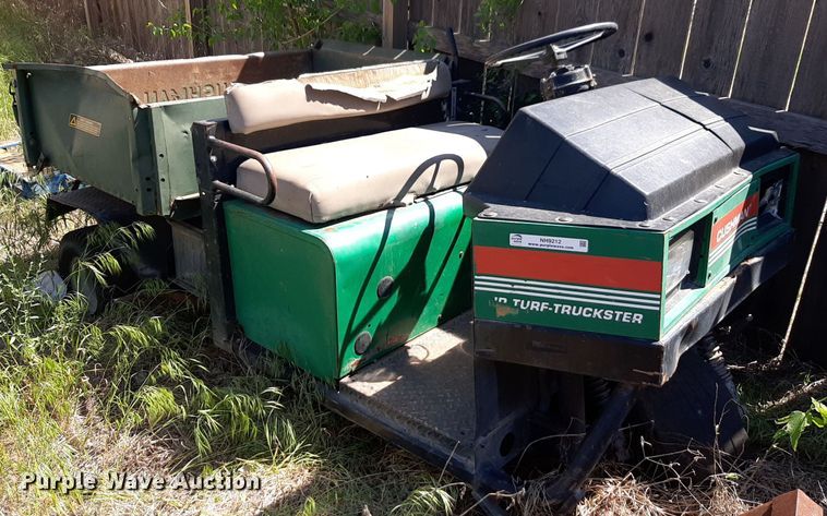 image for item NH9212 (2) Cushman golf carts