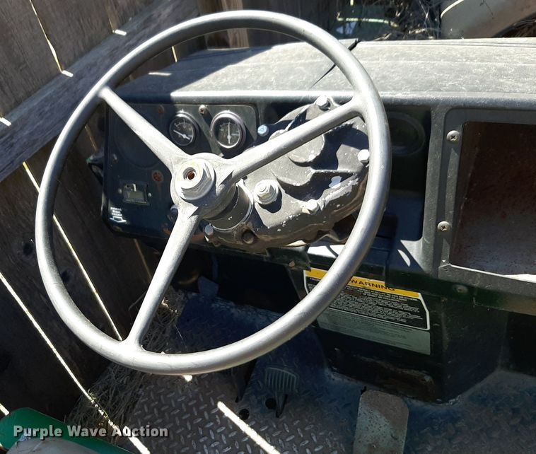 image for item NH9212 (2) Cushman golf carts