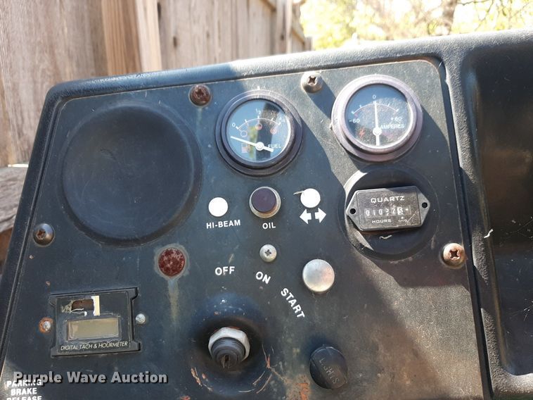 image for item NH9212 (2) Cushman golf carts