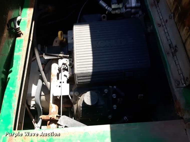 image for item NH9212 (2) Cushman golf carts