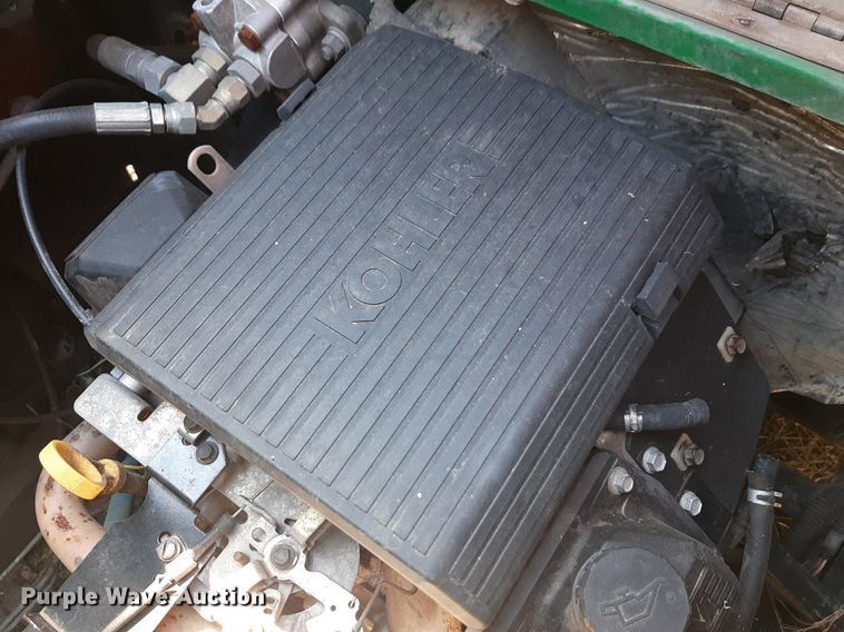 image for item NH9212 (2) Cushman golf carts