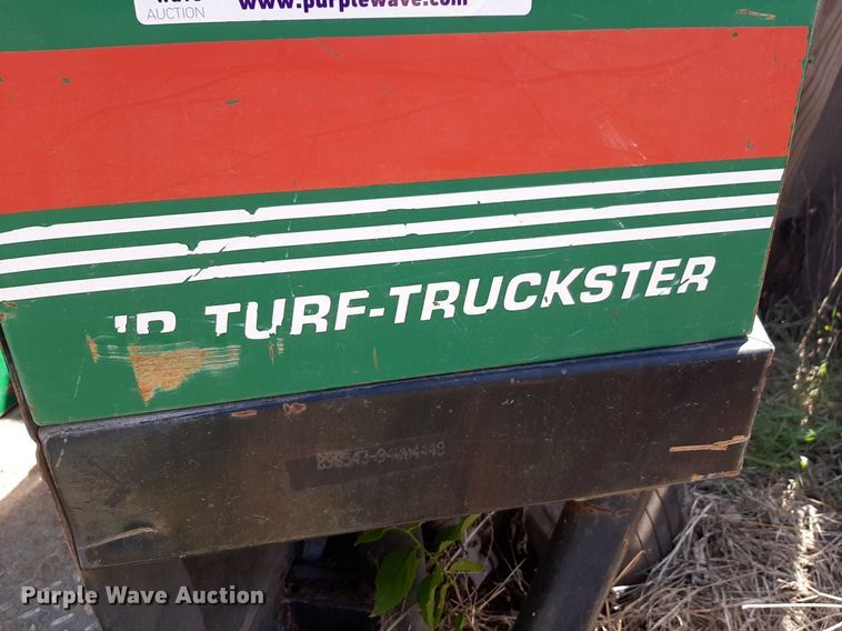 image for item NH9212 (2) Cushman golf carts