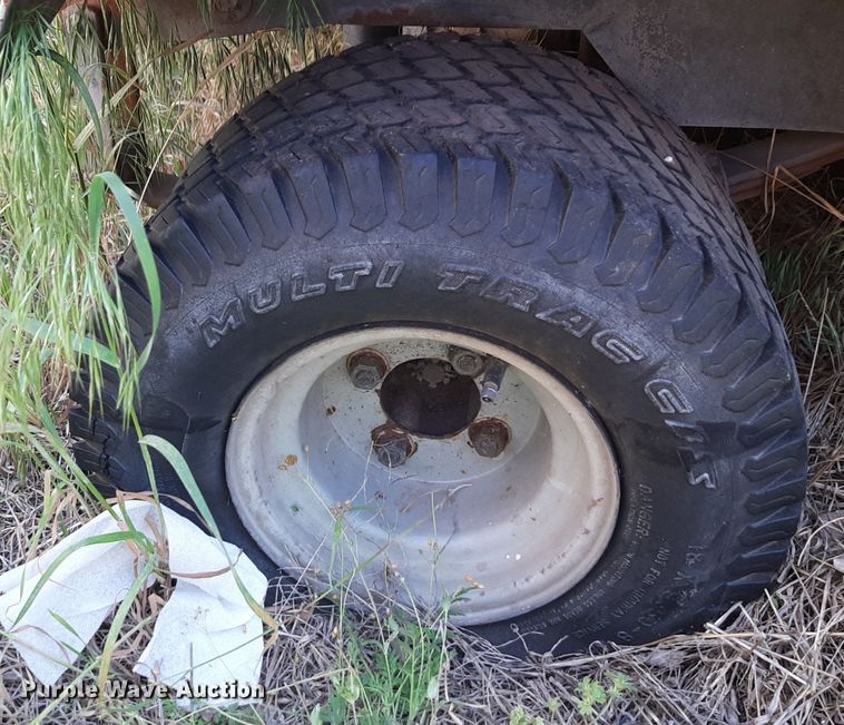 image for item NH9212 (2) Cushman golf carts