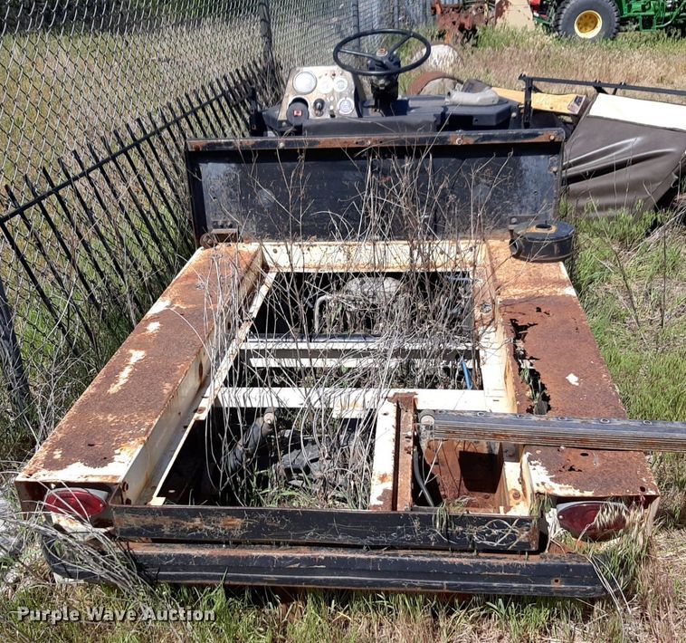 image for item NH9212 (2) Cushman golf carts