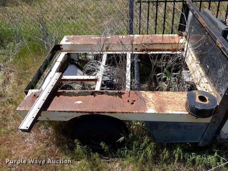 image for item NH9212 (2) Cushman golf carts