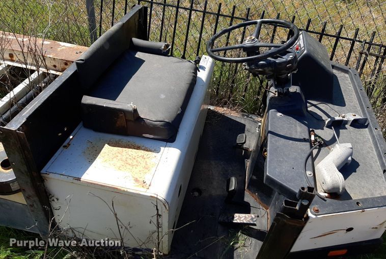 image for item NH9212 (2) Cushman golf carts