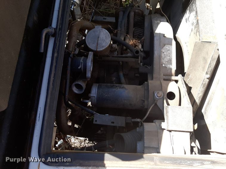 image for item NH9212 (2) Cushman golf carts