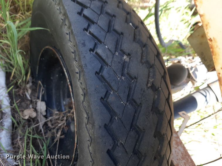 image for item NH9212 (2) Cushman golf carts