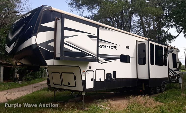 image for item DQ7055 2022 Keystone Raptor toy hauler camper
