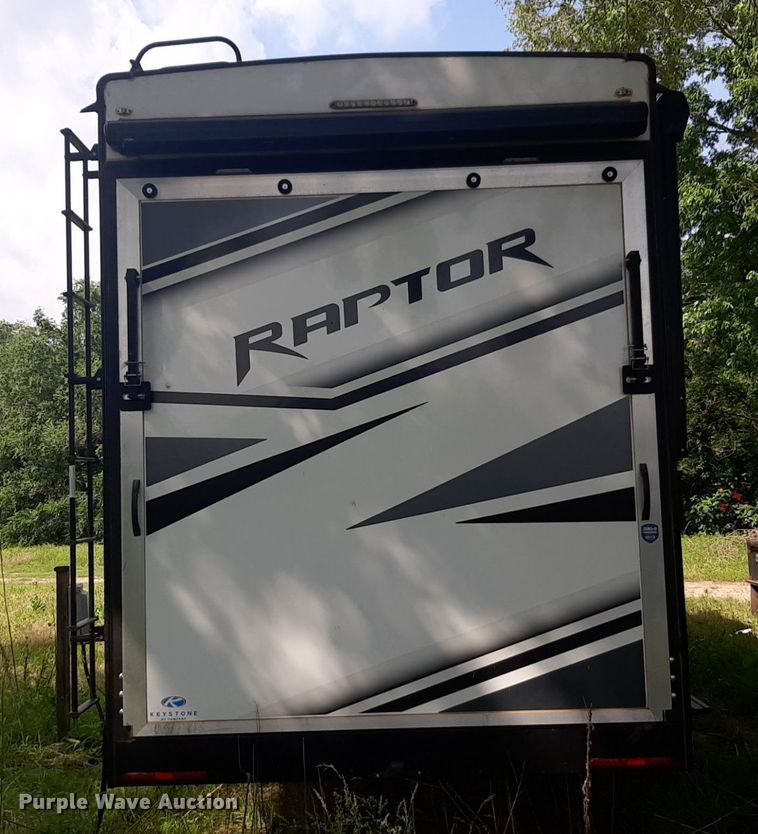image for item DQ7055 2022 Keystone Raptor toy hauler camper