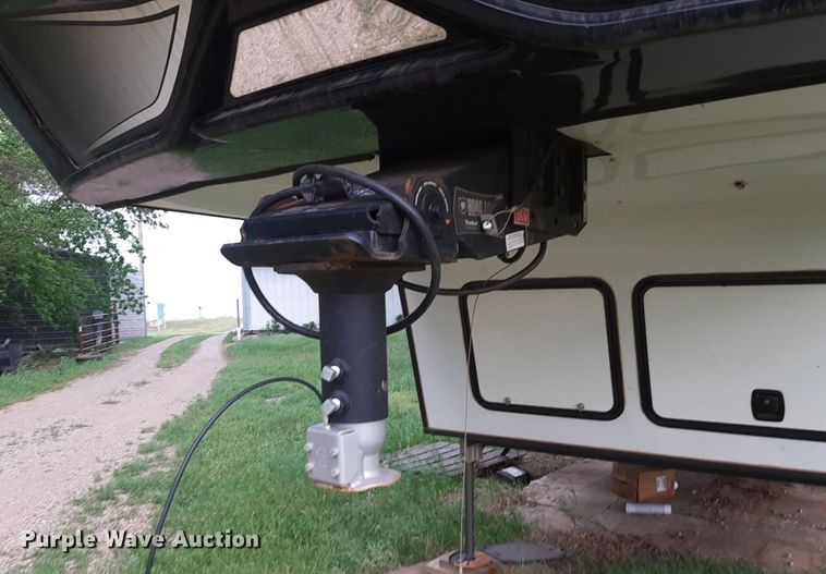 image for item DQ7055 2022 Keystone Raptor toy hauler camper