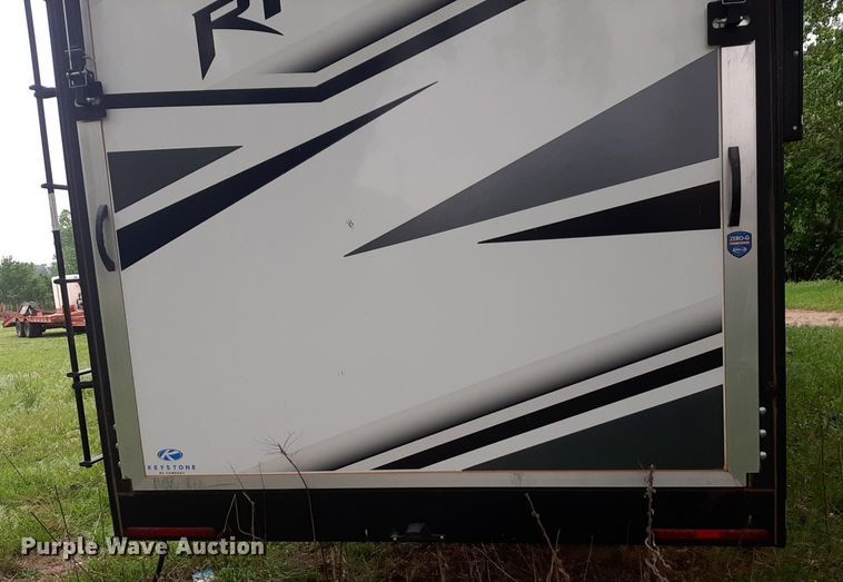 image for item DQ7055 2022 Keystone Raptor toy hauler camper