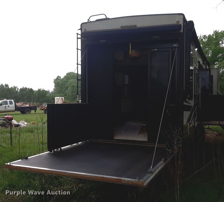 image for item DQ7055 2022 Keystone Raptor toy hauler camper