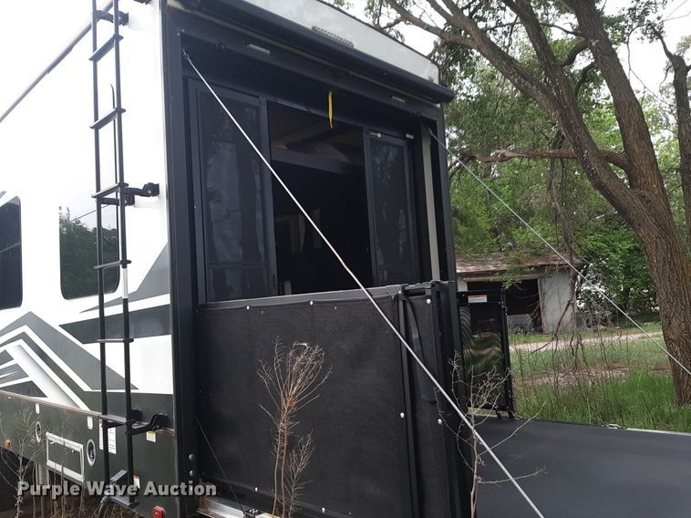 image for item DQ7055 2022 Keystone Raptor toy hauler camper