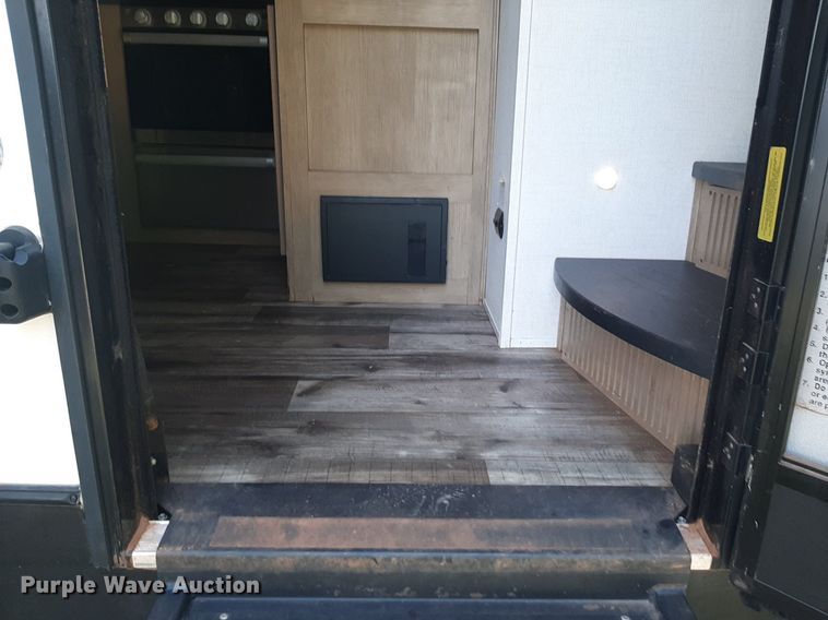 image for item DQ7055 2022 Keystone Raptor toy hauler camper