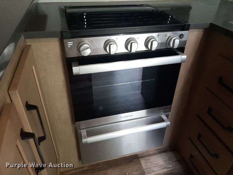 image for item DQ7055 2022 Keystone Raptor toy hauler camper