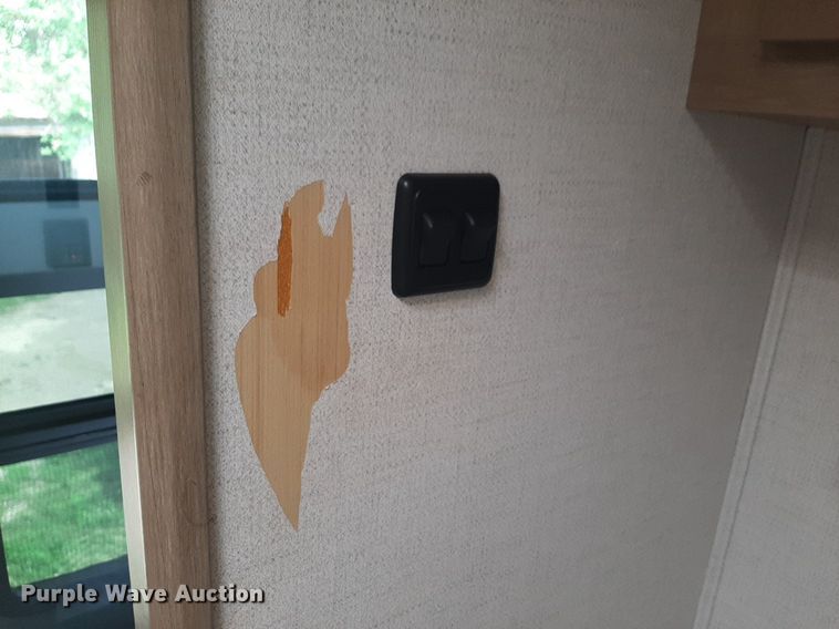 image for item DQ7055 2022 Keystone Raptor toy hauler camper