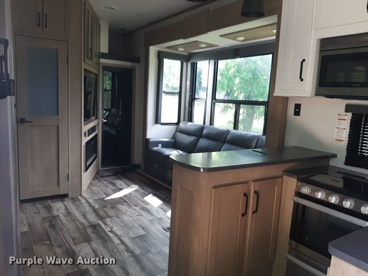 image for item DQ7055 2022 Keystone Raptor toy hauler camper