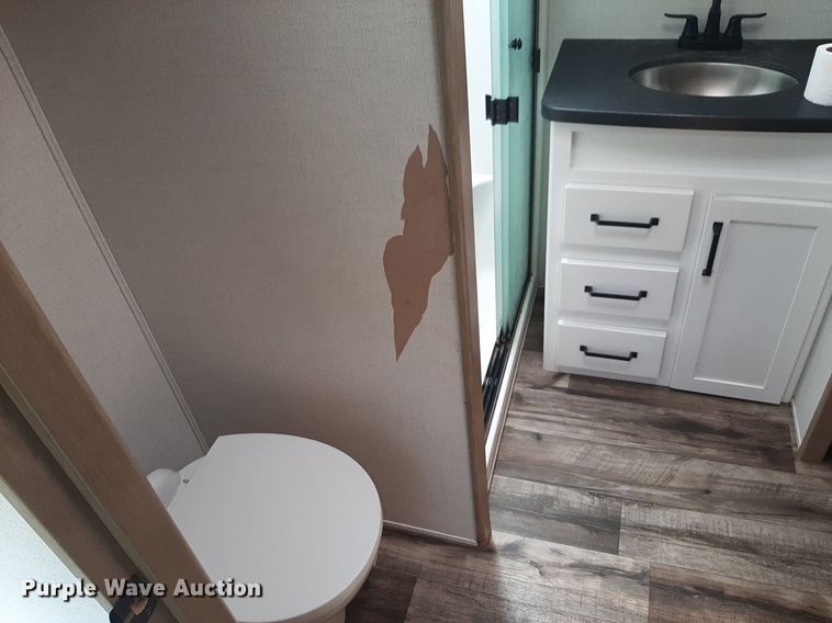 image for item DQ7055 2022 Keystone Raptor toy hauler camper