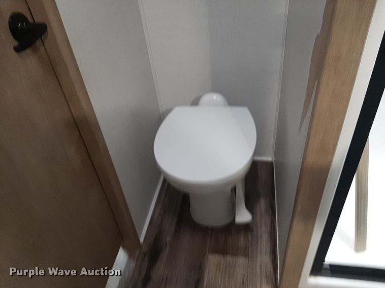 image for item DQ7055 2022 Keystone Raptor toy hauler camper