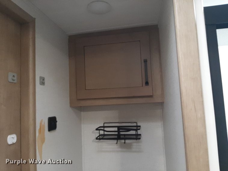 image for item DQ7055 2022 Keystone Raptor toy hauler camper