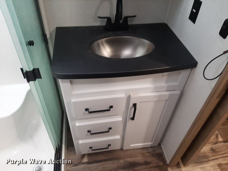 image for item DQ7055 2022 Keystone Raptor toy hauler camper