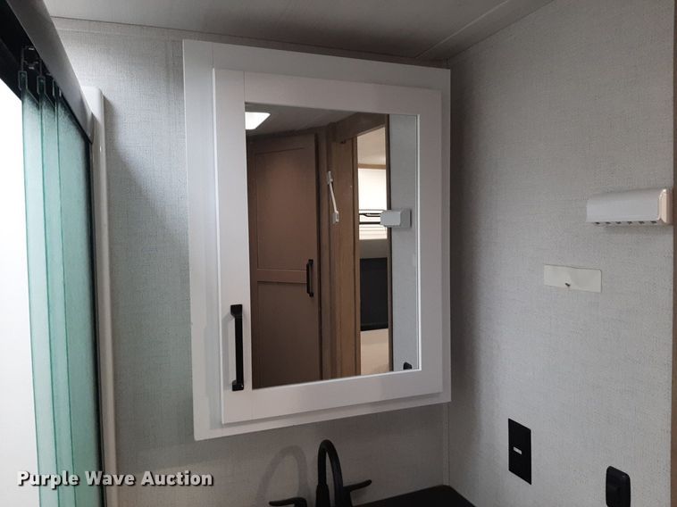 image for item DQ7055 2022 Keystone Raptor toy hauler camper